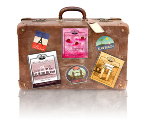 suitcase with Marjim Manor and stickers